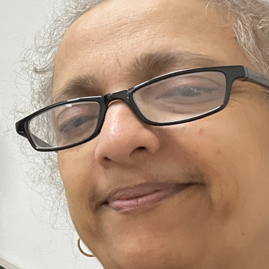 Artist profile of Anu Vedagiri smiling