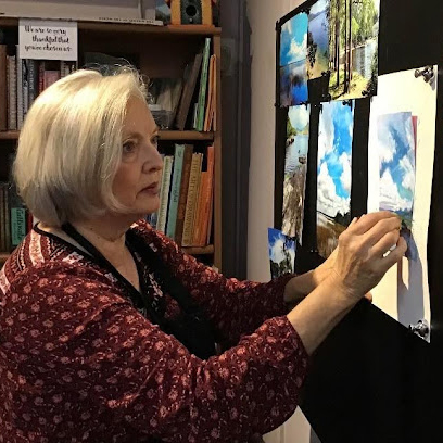 Deborah Brown focused on a painting